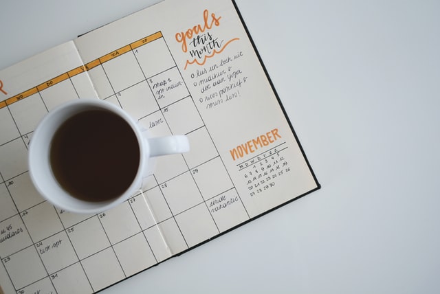 planner and coffee